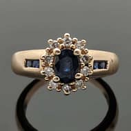 R655 Sersi yellow gold ring with a blue sapphire