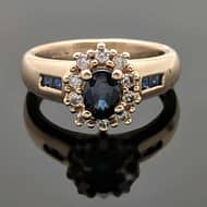 R655 Sersi yellow gold ring with a blue sapphire front view
